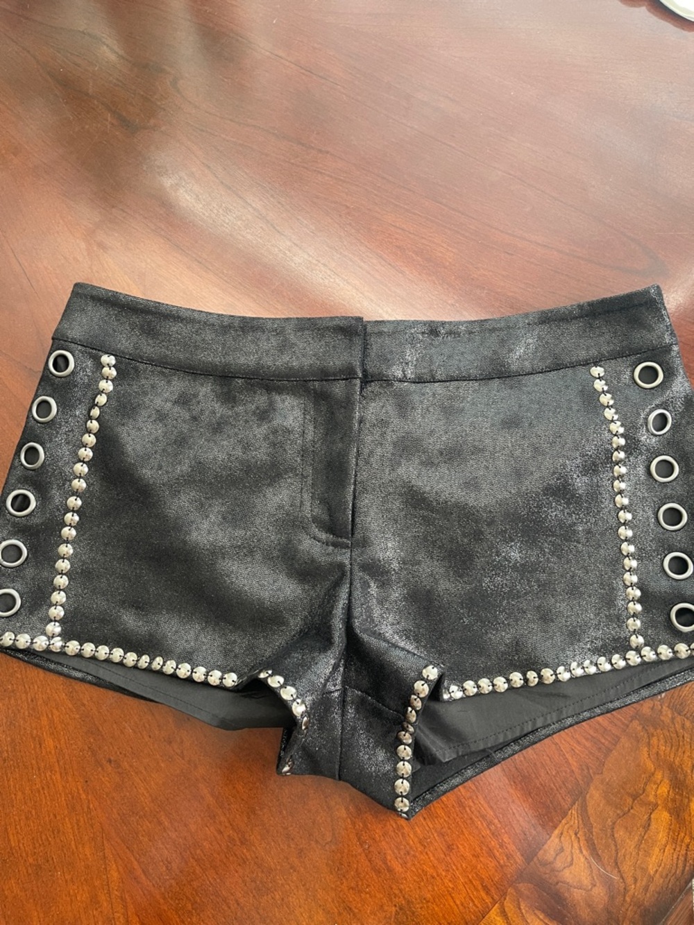 bebe Black Metallic Stud Grommet Bike Shorts 00 leather